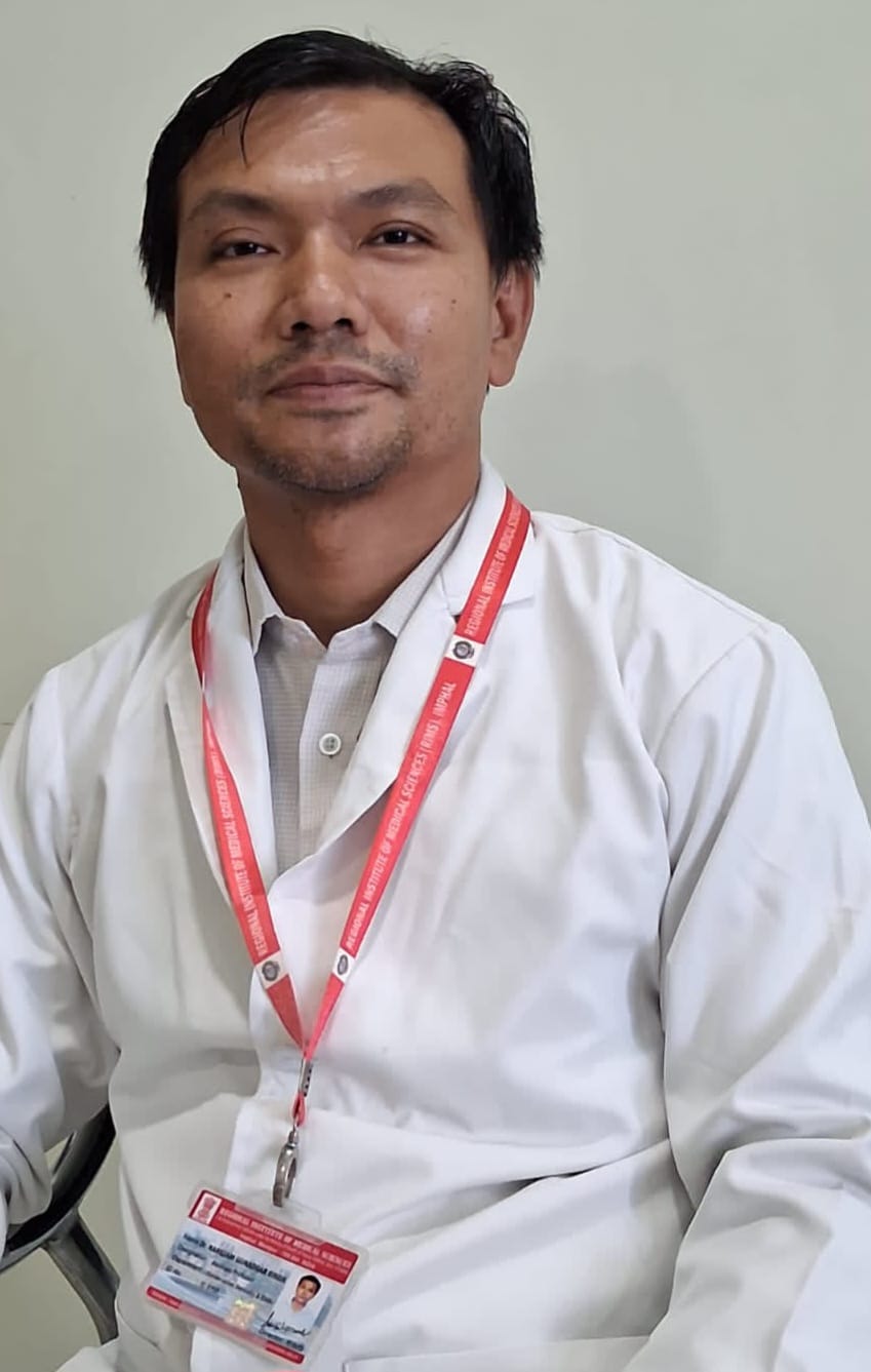 Dr. Kangjam Gunadhar Singh